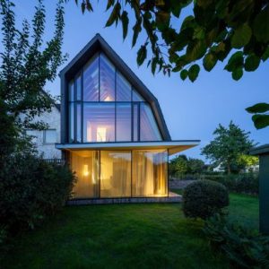 “Glass lantern” roof tops barracks house conversion in Germany by Andreas Schüring Architekten